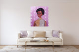 Black Barbie oil painting by artist Judy Ragagli in front of creme couch 