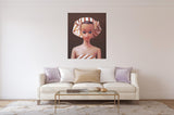 Vintage Fashion Queen Barbie oil painting by Judy Ragagli hangiing in front a creme sofa.